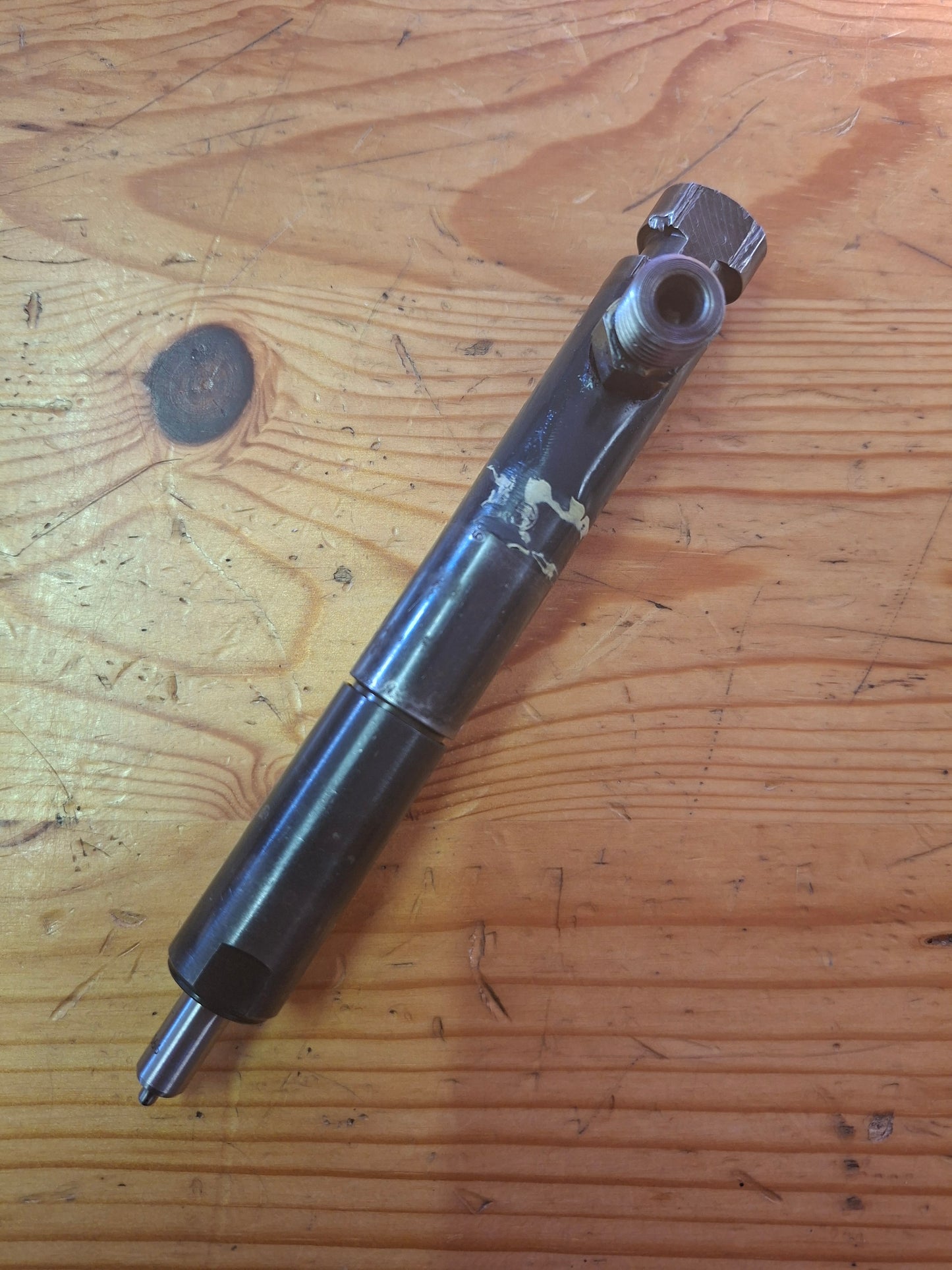 AUSTAUSCH Einspritzdüse Lecköl oben 131100080019