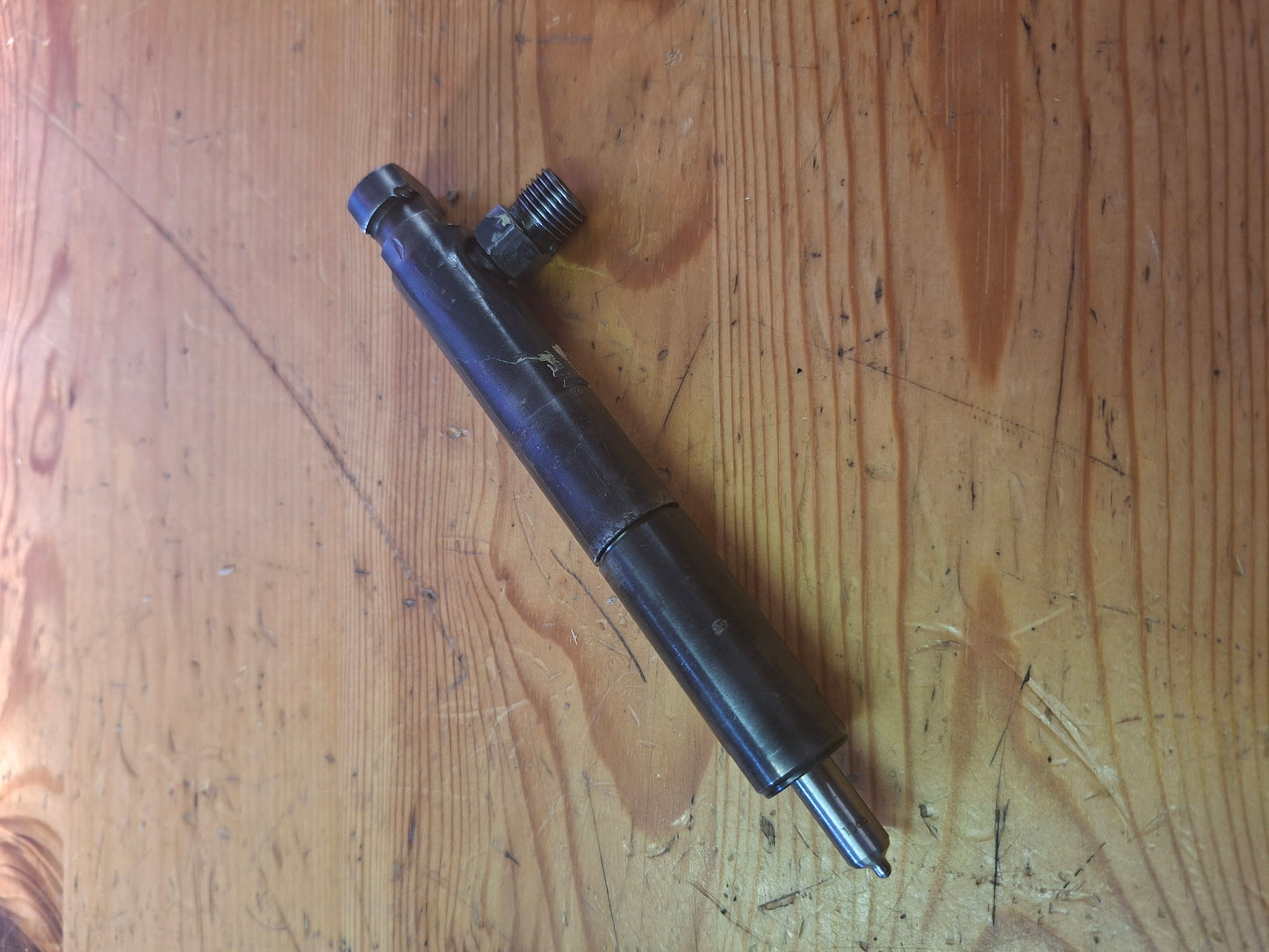 AUSTAUSCH Einspritzdüse Lecköl oben 131100080019